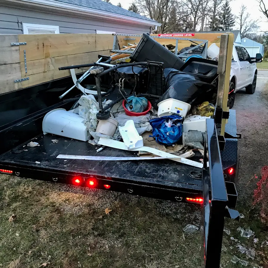 Roll-off dumpster delivered to a residential driveway in Lake Barcroft
